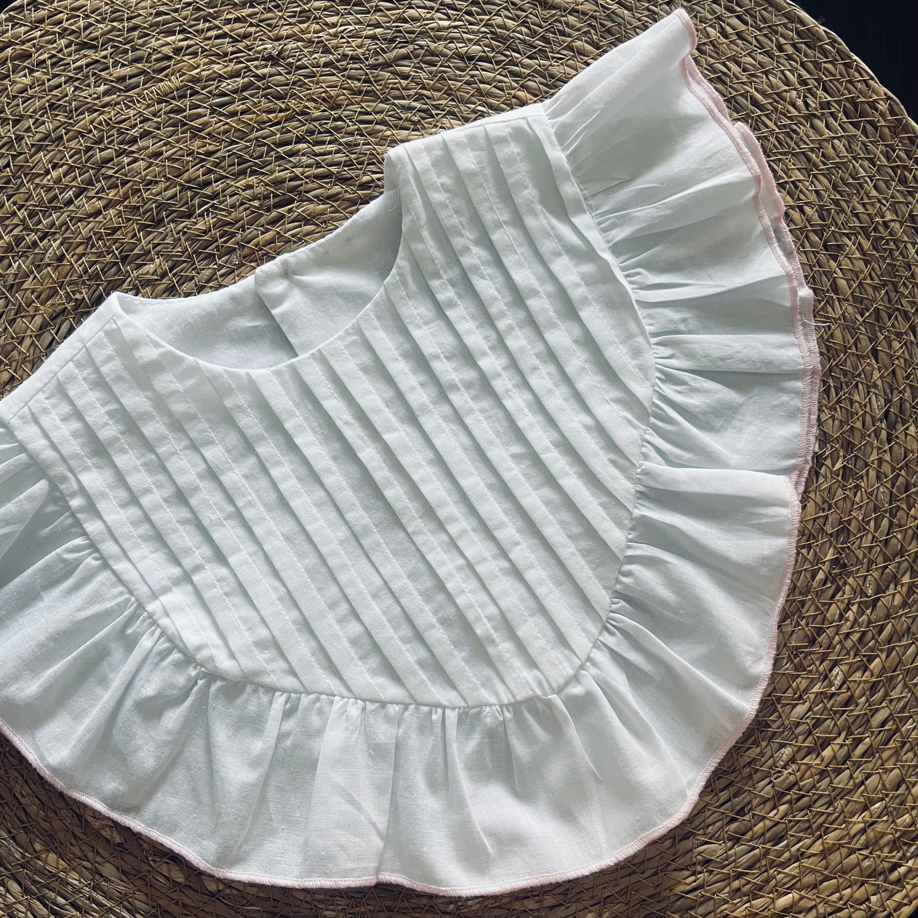 Cuello pico jaretas